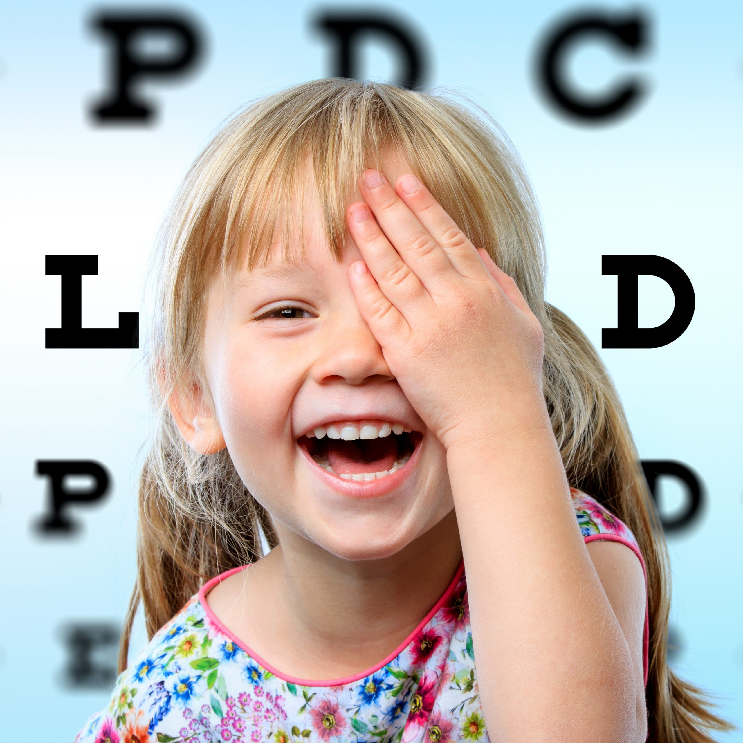 Girl having fun at vision test.